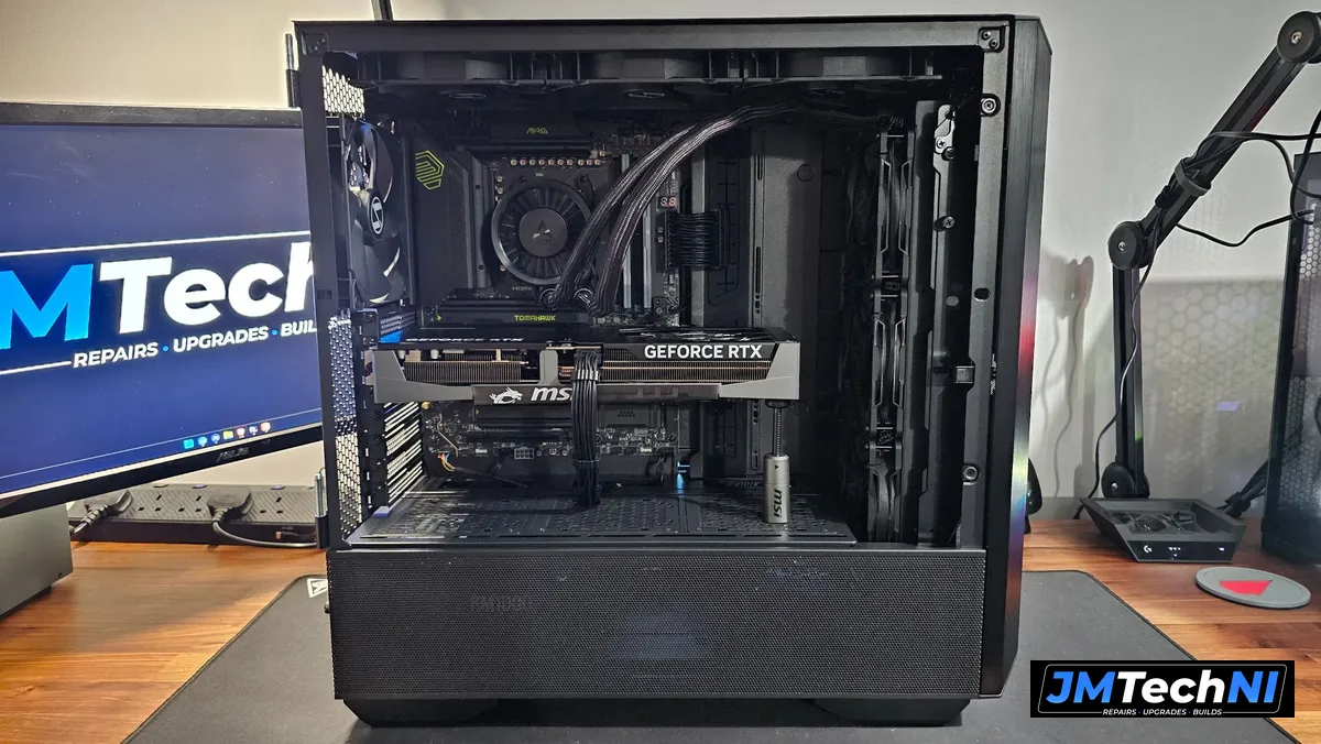 Finished build — RTX 5080 with the 360mm AIO mounted at the front